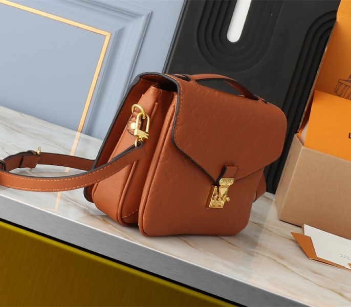 Louis Vuitton Monogram Empreinte Metis Handbag In Cognac Brown angle 4