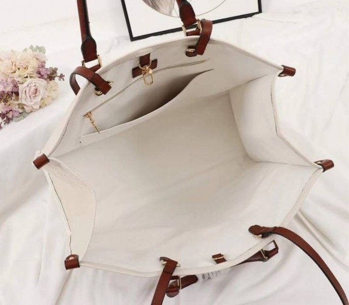 Louis Vuitton Monogram Empreinte Giant Onthego GM Tote In Cream – Brown angle 5