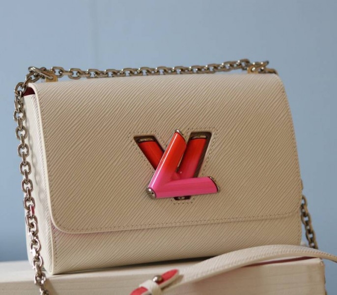 Louis Vuitton Epi Leather Twist MM Limited Edition Bag In Quartz White angle 2