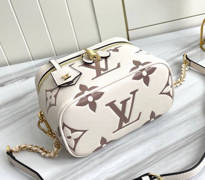 Louis Vuitton Bicolor Monogram Empreinte Vanity PM Bag In Cream And Bois De Rose Pink angle 3