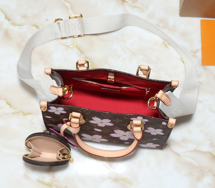 X TM Monogram Canvas Onthego PM With Cherry Blossom angle 5