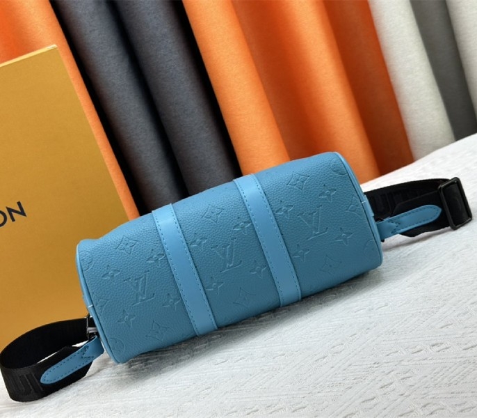 Louis Vuitton Taurillon Monogram Leather Keepall Bandouliere 25 In Turquoise angle 5