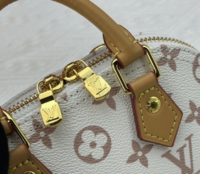 Louis Vuitton Monogram Dune Canvas Nano Alma Bag angle 2