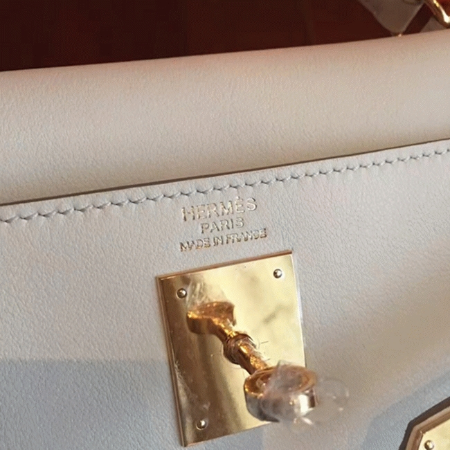 Ivory Swift Fake Hermes Kelly Retourne 32cm Refined Purse angle 3