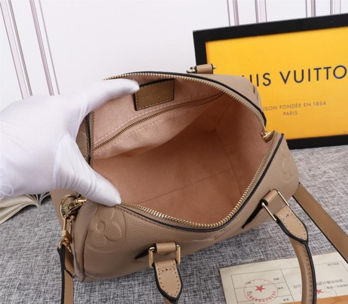 Louis Vuitton Monogram Empreinte Leather Speedy Bandouliere 25 Handbag In Tourterelle Gray angle 5