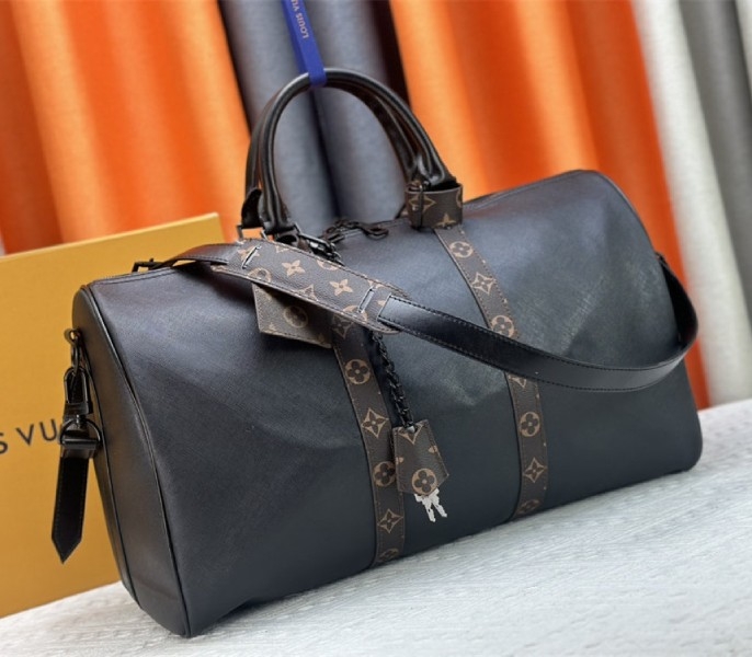Louis Vuitton Taiga Leather Keepall Bandouliere 45 In Black And Monogram Macassar Canvas angle 2