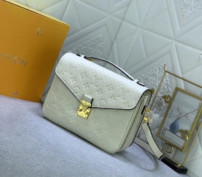 LV Monogram Empreinte Leather Metis In Cream M46552 angle 2