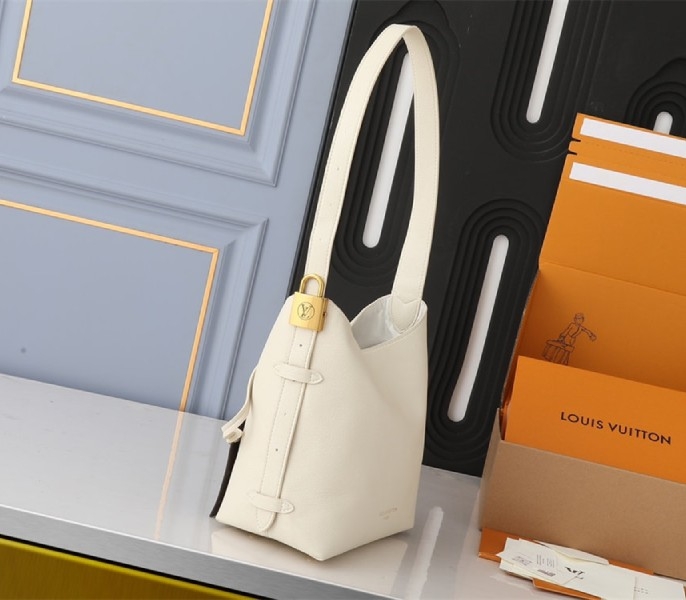 Louis Vuitton Low Key MM Hobo In Quartz White angle 3