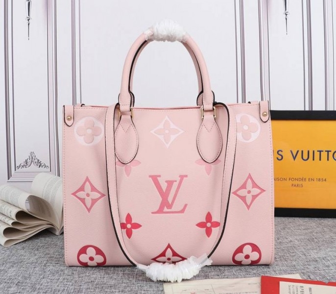 Louis Vuitton Monogram Empreinte Leather Onthego MM Bag In Pink angle 3