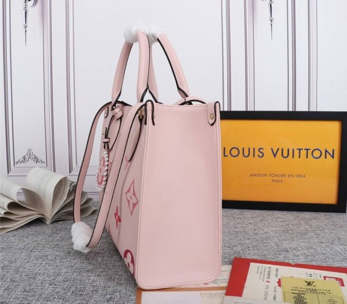 Louis Vuitton Monogram Empreinte Leather Onthego MM Bag In Pink angle 4