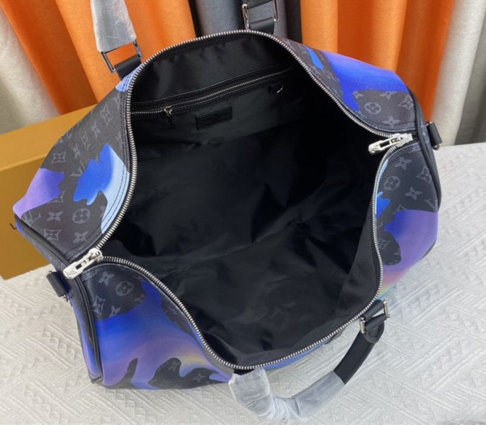 Louis Vuitton Monogram Eclipse Keepall 55 Bandouliere Travel Bag In Blue Sunrise angle 5