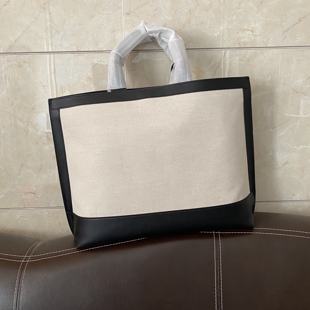 SHOPPING TAG IN CANVAS AND LEATHER angle 2