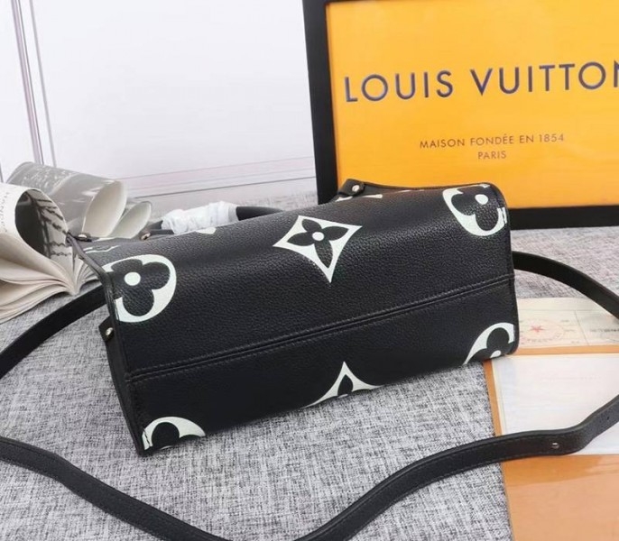 Louis Vuitton Bicolor Monogram Empreinte Leather Onthego PM Bag In Black And Beige angle 4