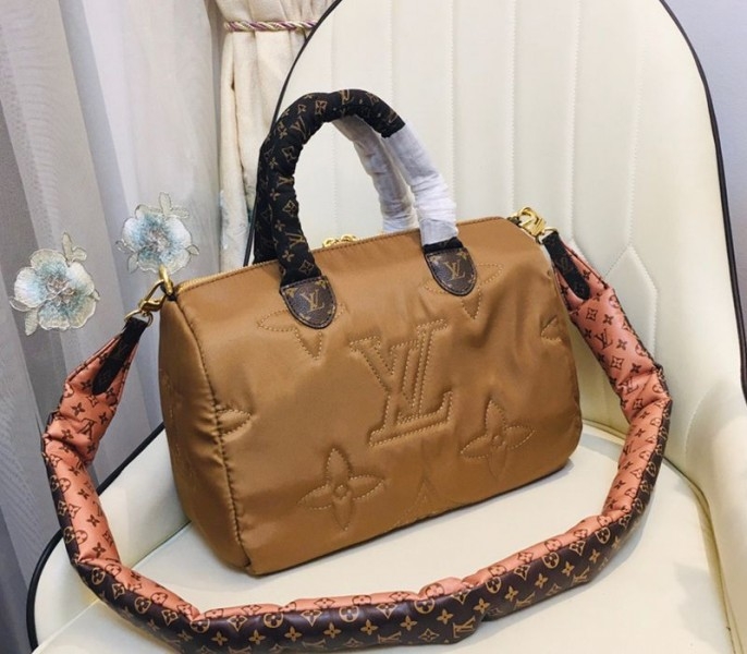 Louis Vuitton Econyl Regenerated Nylon Speedy Bandouliere 30 Handbag In Beige angle 2