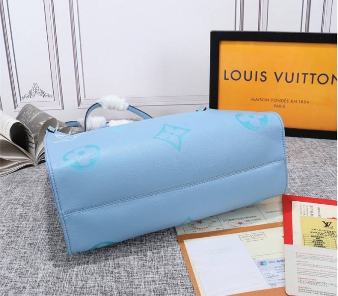 Louis Vuitton Monogram Empreinte Leather Onthego MM Bag In Summer Blue angle 4
