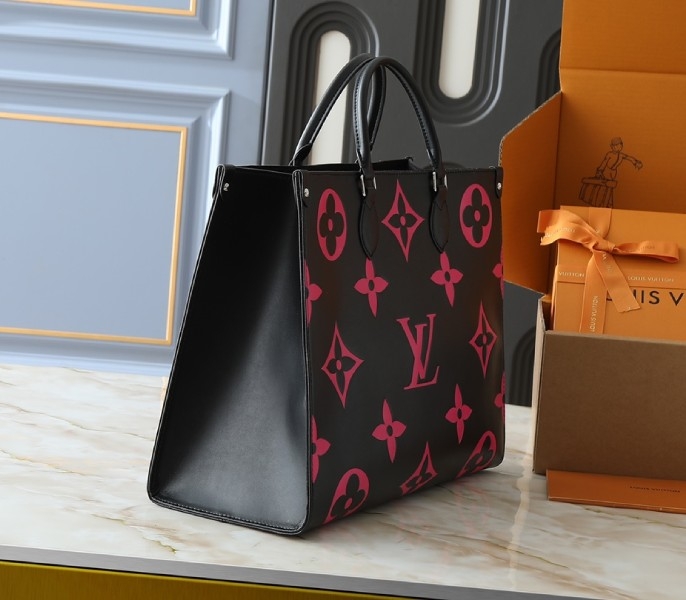 Monogram Empreinte OnTheGo GM Tote In Black And Magenta Pink angle 2