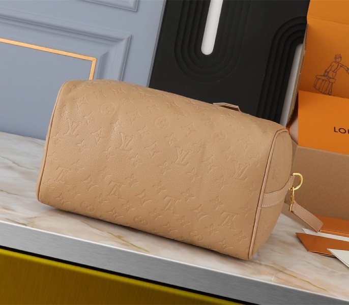 Louis Vuitton Monogram Empreinte Speedy Soft 30 Handbag In Apricot angle 3