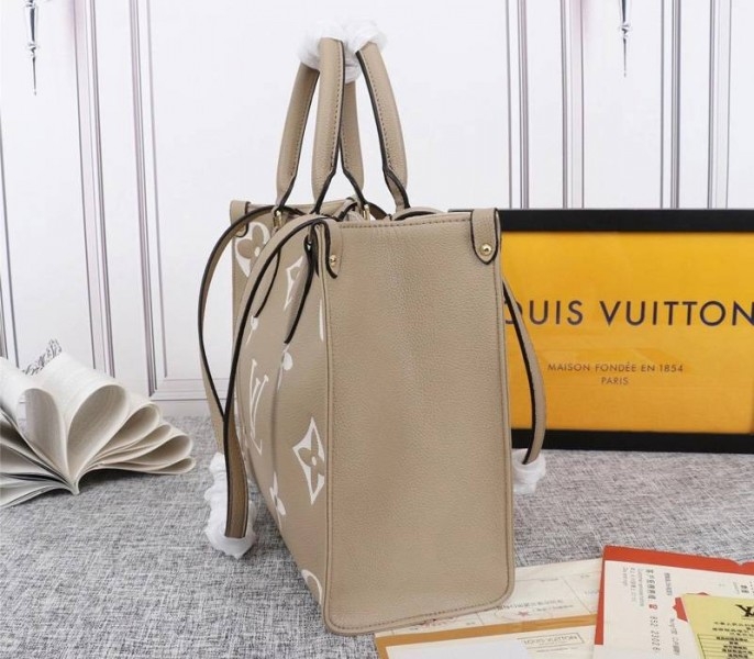 Louis Vuitton Monogram Empreinte OnTheGo MM Tote In Tourterelle Gray angle 3