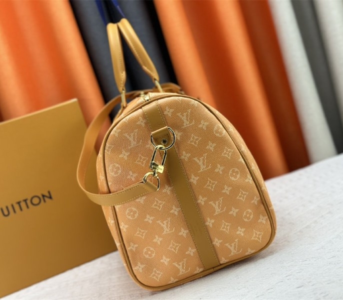 Louis Vuitton Monogram Heritage Canvas Keepall Bandouliere 45 In Yellow angle 5