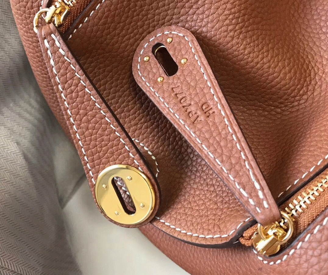Top replica Hermes Lindy Mini handbag in gold angle 4