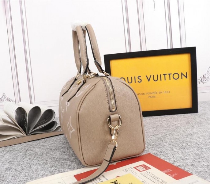 Louis Vuitton Bicolor Monogram Empreinte Leather Speedy Bandouliere 25 Handbag In Tourterelle Gray And Cream angle 3