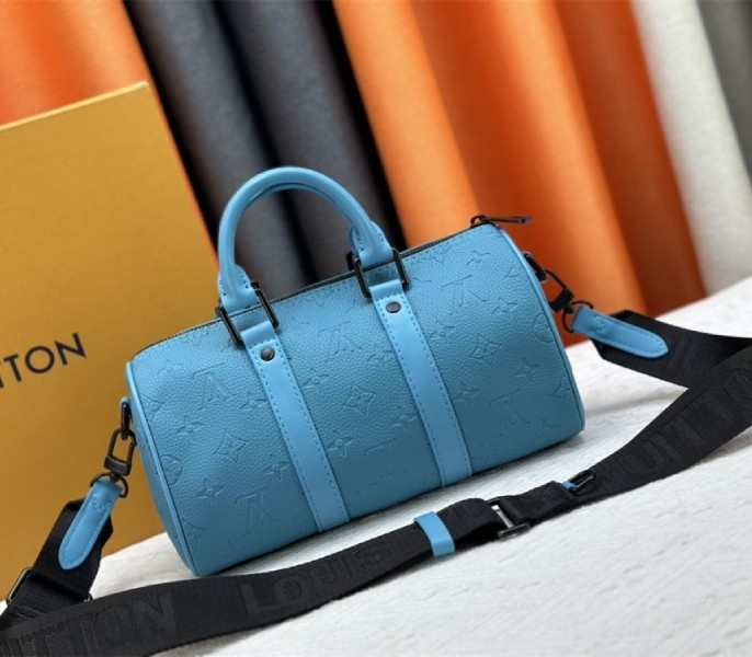 Louis Vuitton Taurillon Monogram Leather Keepall Bandouliere 25 In Turquoise angle 3