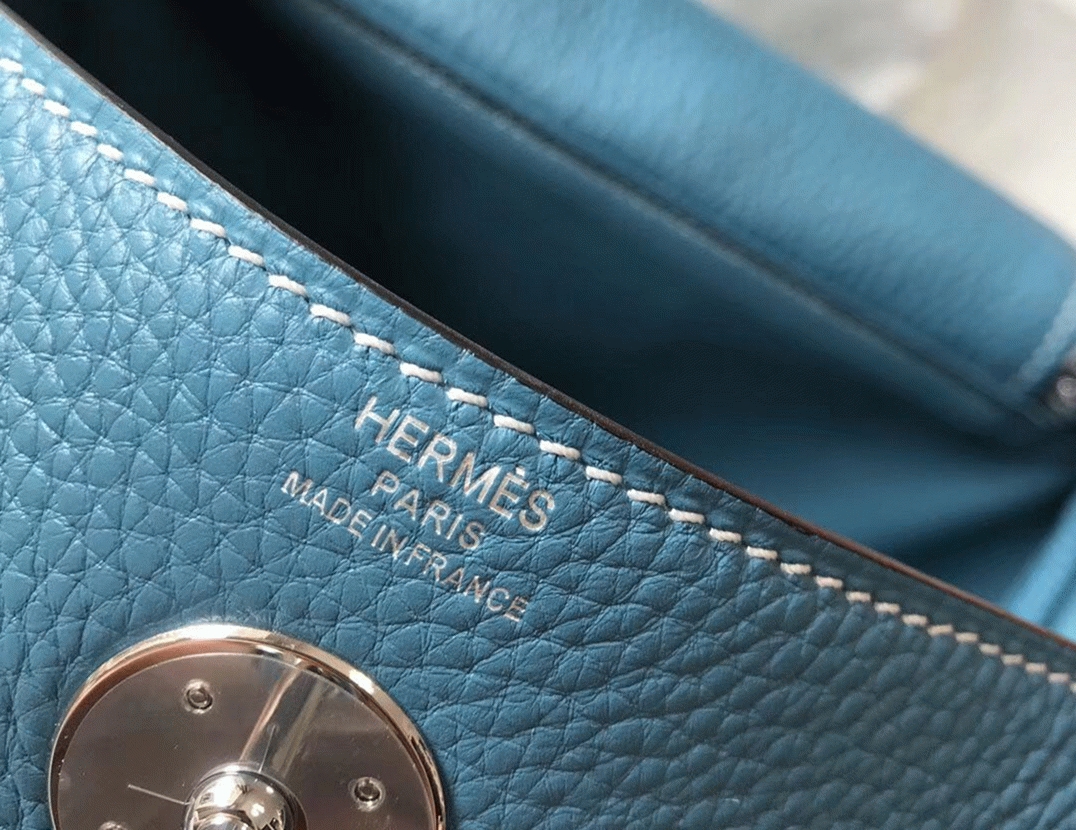 Replica Hermes Lindy 26cm bag in blue jean fabric angle 4