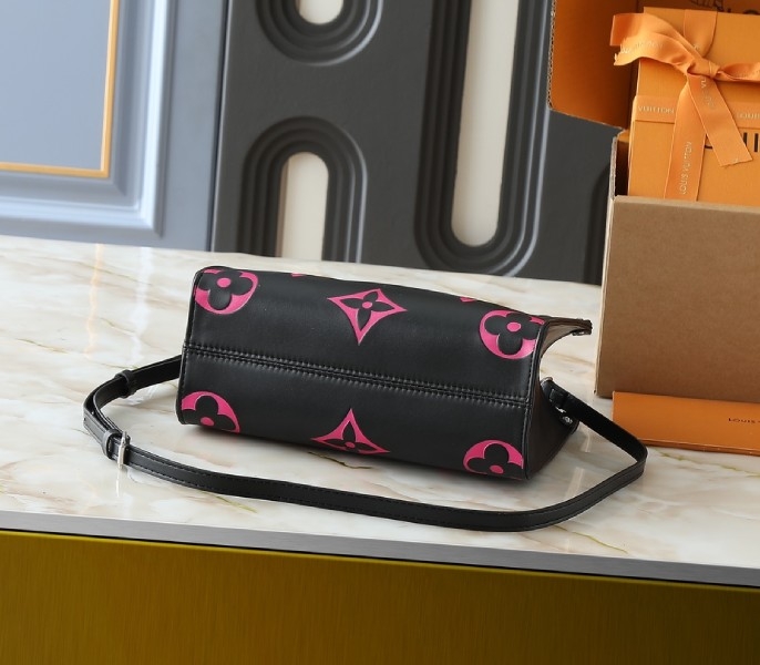 Monogram Empreinte OnTheGo PM Tote In Black And Magenta Pink angle 4