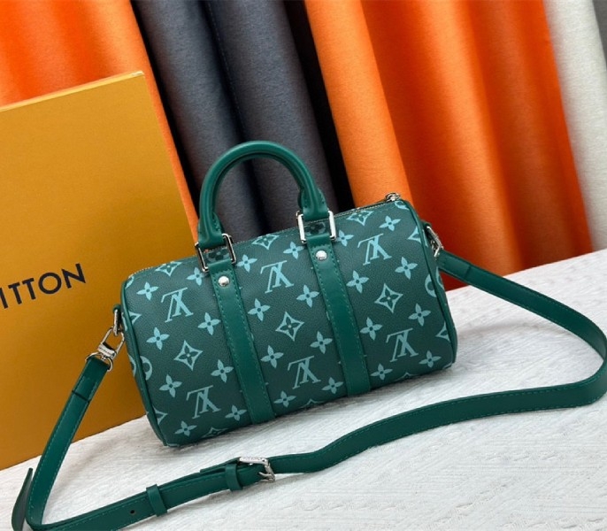 Louis Vuitton Monogram Heritage Canvas Keepall Bandouliere 25 In Green angle 3