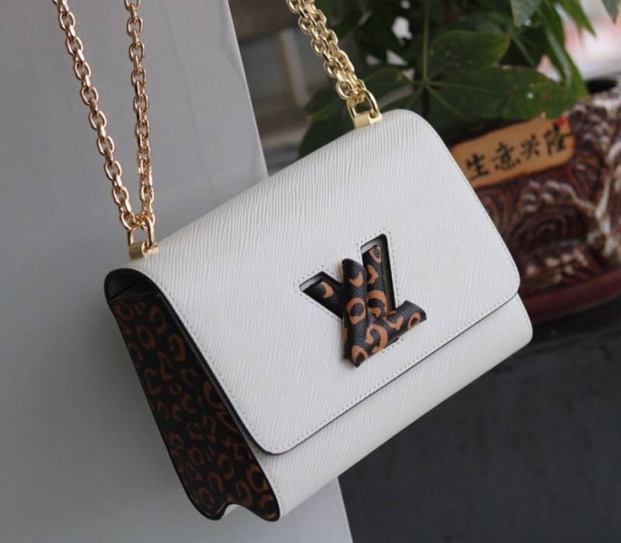 Louis Vuitton Epi Leather Jungle Edition Twist MM Bag In Optic White angle 2