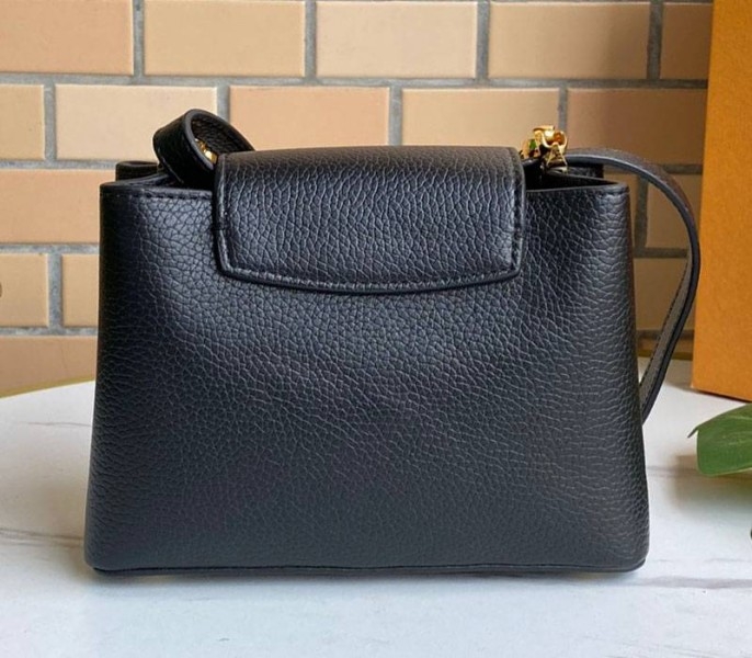 Louis Vuitton Capucines Mini Chain Bag In Black angle 4