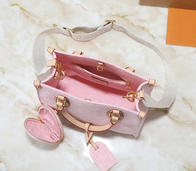 Monogram Denim OnTheGo PM In Washed Pink angle 5