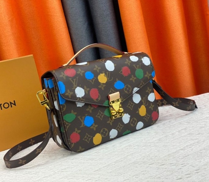 Louis Vuitton X YK Monogram Canvas Metis Handbag angle 2