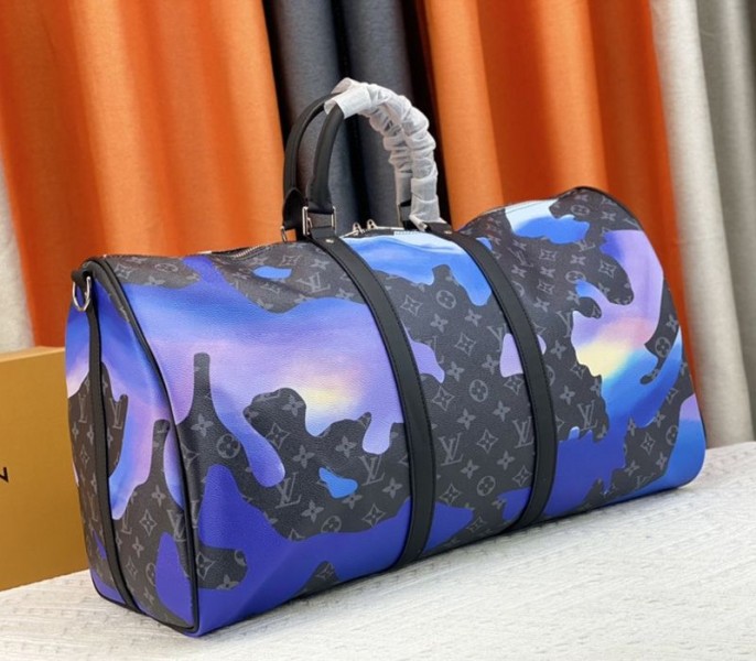 Louis Vuitton Monogram Eclipse Keepall 55 Bandouliere Travel Bag In Blue Sunrise