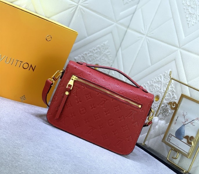 LV Monogram Empreinte Leather Metis In Red angle 3