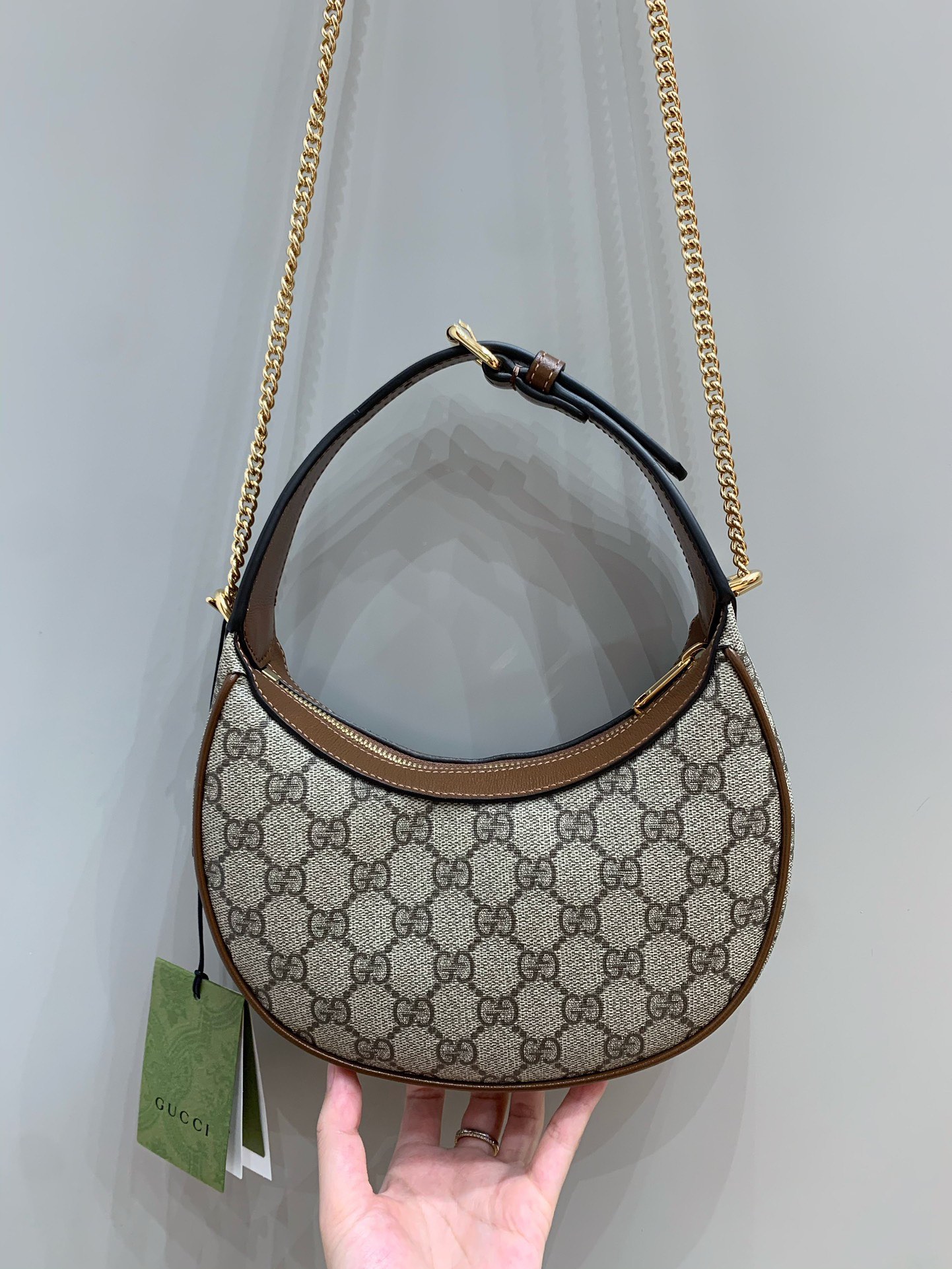 Ophidia handle bag angle 3