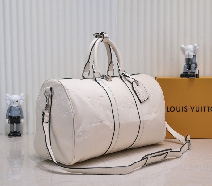 LV Monogram Empreinte Keepall Bandouliere 45 In Cream angle 2