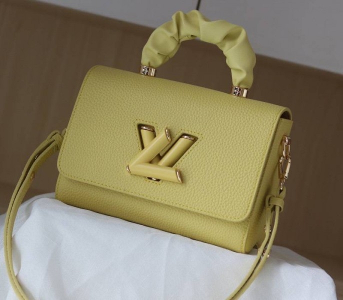 Louis Vuitton Taurillon Leather Twist MM Scrunchie Handle In Ginger Yellow