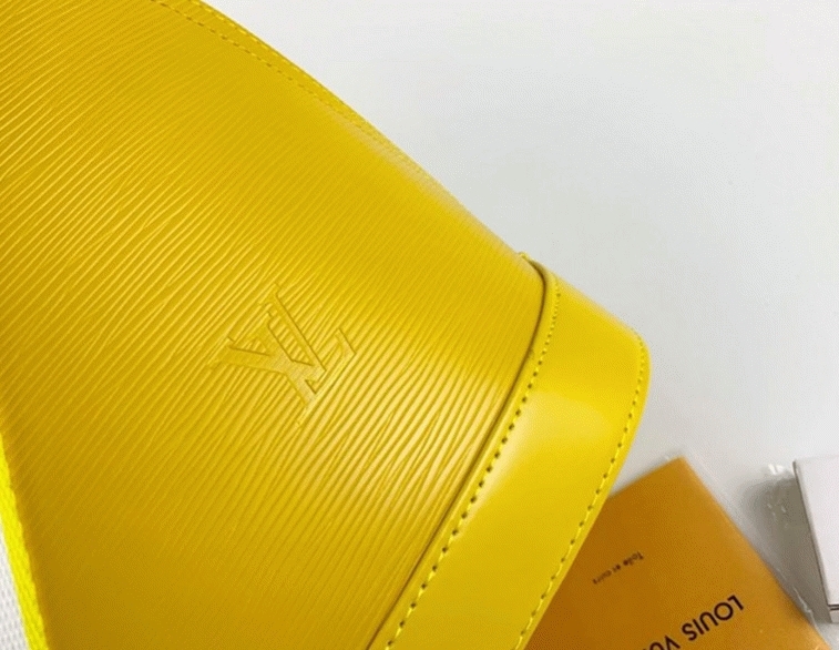 Louis Vuitton Epi Leather Alma PM Handbag In Cedrat Yellow With Jacquard Strap angle 2