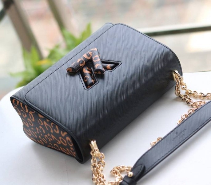 Louis Vuitton Epi Leather Jungle Edition Twist MM Bag In Black angle 3