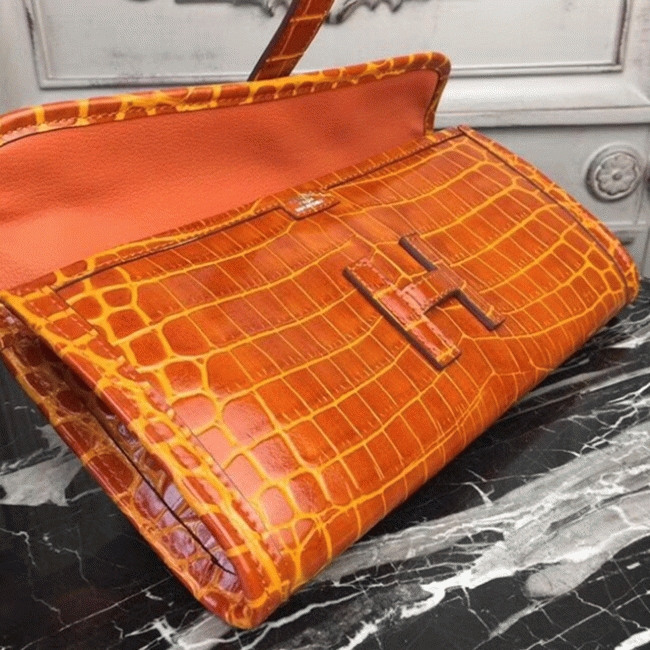 Orange crocodile leather knockoff Hermes Jige Elan clutch bag angle 4
