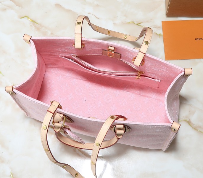 Monogram Denim OnTheGo MM In Washed Pink angle 3