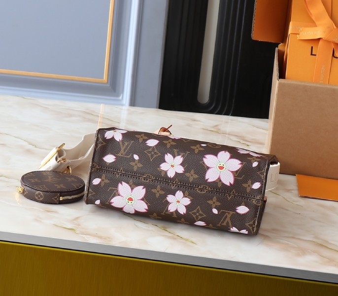 X TM Monogram Canvas Onthego PM With Cherry Blossom angle 4