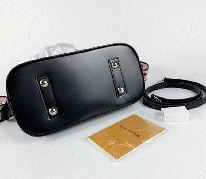 Louis Vuitton Epi Leather Alma BB Handbag In Black With Jacquard Strap angle 4