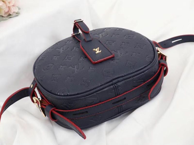 Louis Vuitton Monogram Empreinte Boite Chapeau Souple MM Bag In Navy Blue angle 4