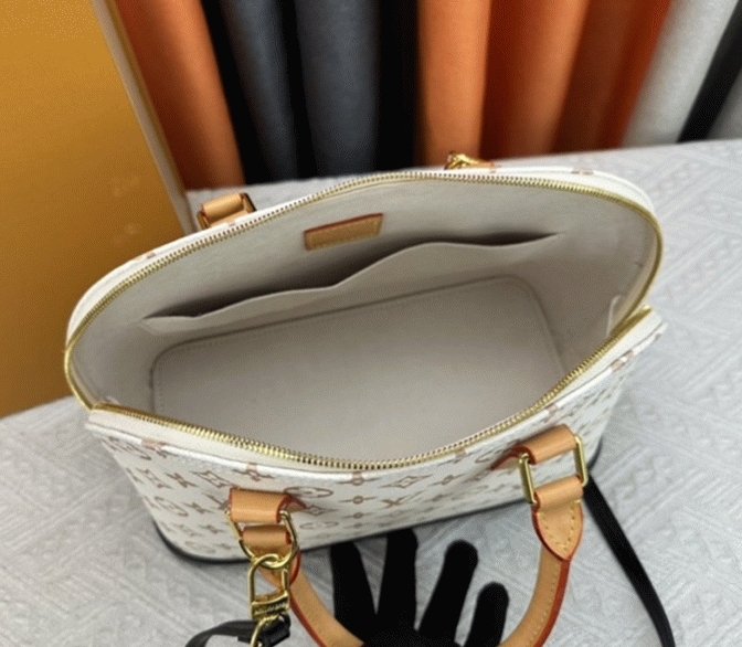 Louis Vuitton Monogram Dune Canvas Alma PM Bag angle 4