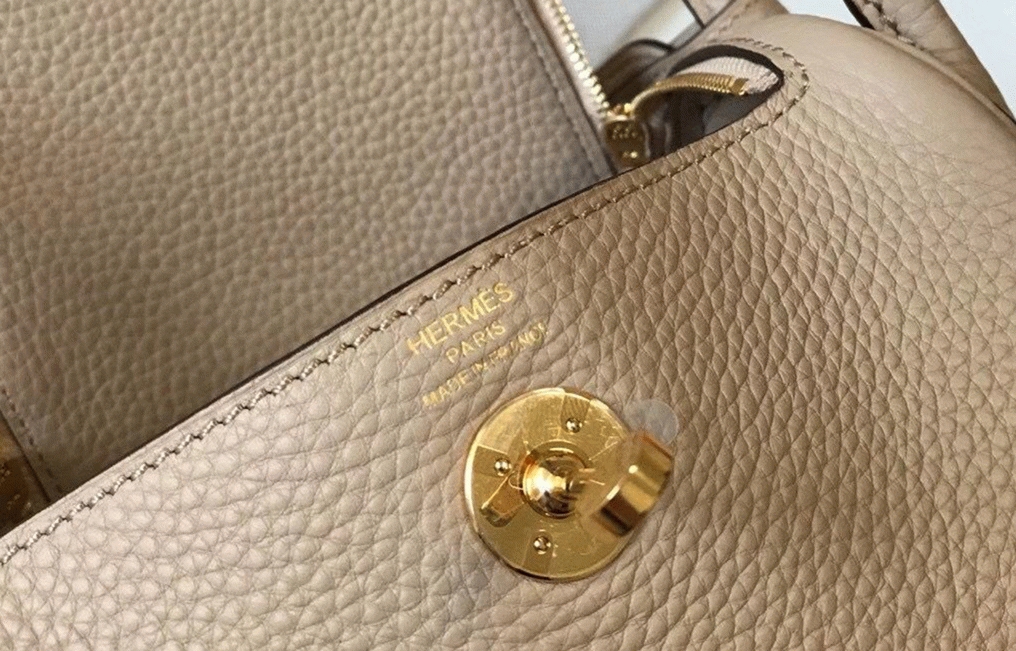 Top replica Hermes Lindy Mini handbag in trench color angle 3