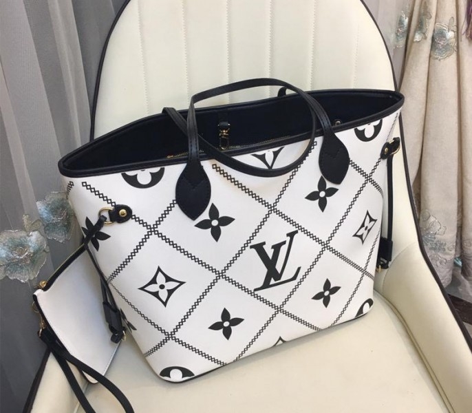 Louis Vuitton Spring 2022 Monogram Empreinte Neverfull MM Tote In Cream angle 4