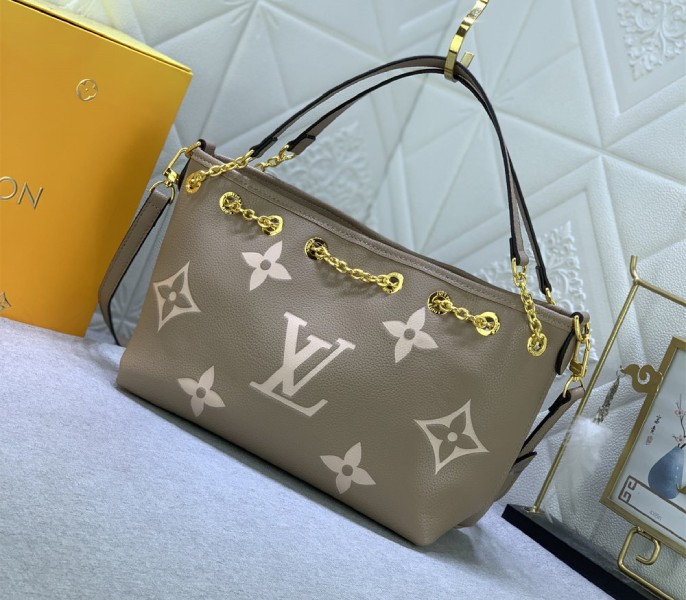 Louis Vuitton Bicolor Monogram Empreinte Bundle Bag In Tourterelle Gray and Cream angle 5