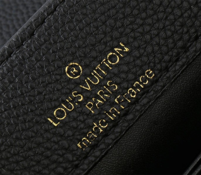 Louis Vuitton Capucines Mini Capucines Handbag In Black angle 5